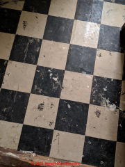 Black & white asbestos containing floor tile - how to handle (C) InspectApedia.com Quentin