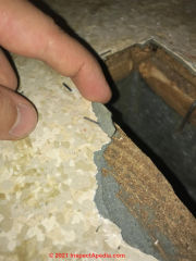 Asbestos likely in this 1962 Canadian sheet flooring (C) Inspectapedia.com Hogan
