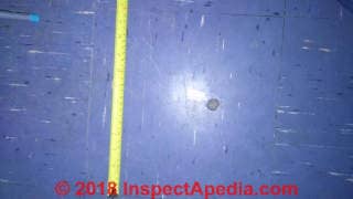 Blue asbestos suspect floor tile (C) InspectApedia.com Will