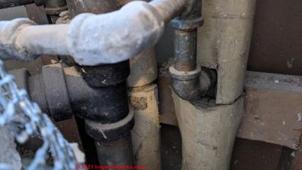 Asbestos suspect pipe insulation and possible improper asbestos removal (C) InspectApedia.com Ben Pipe Anon