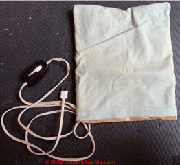 Antique heating pad may contain asbestos (C) InspectApedia.com Chu
