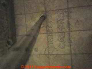 Cambria imprint on Armstrong sheet vinyl flooring that may contain asbestos (C) InspectApedia.com Karrie