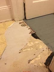 Asbestos floor tile for identification (C) InspectApedia.com Terry
