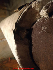 Asbestos suspect pipe insulation (C) InspectApedia.com AQ