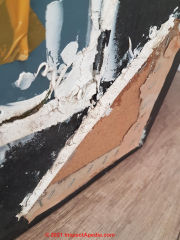 Possible asbestos in putty or caulk onold mirror (C) InspectApedia.com Putty