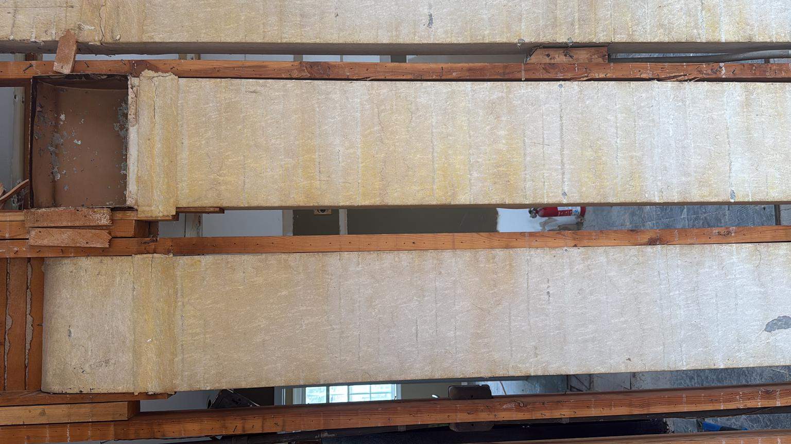 Asbestos paper HVAC duct wrap (C) InspectApedia.com Krysta