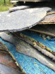 Blue vinyl asphalt asbestos floor tile (C) InspectApedia.com Jj