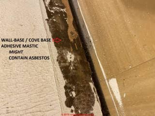Black mastic adhesive used for cove base or wall base trim or for floor tiles may contain asbestos, dependign on age, country of origin and other details (C) InspectApedia.com James