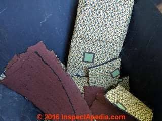 Asphalt-based red-backed sheet flooring, not asbestos (C) InspectApedia.com SM