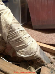 wrapping around attic strut (C) InspectApedia.com Jarvin