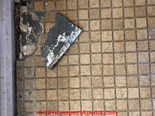 Black fabric backed floor tile not asbestos (C) InspectApedia.com Chris