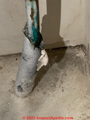 Black foam pipe insulation - not asbestos (C) Inspectapedia.com Morgan