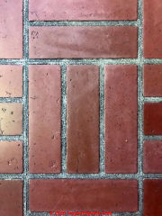 Red brick vinyl asbestos floor tile (C) InspectApedia.com