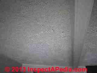Asbestos-suspect acoustic ceiling tile after seal-over (C) InspectApedia SF