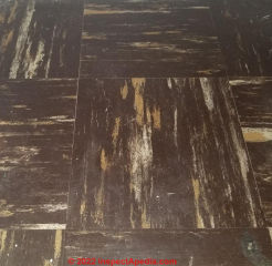 1957 dark brown and black tiles (C) InspectApedia.com Brandy