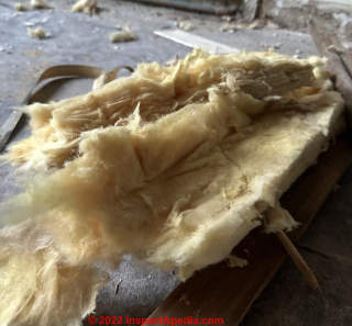 yellow fiberglass insulation (C) InspectApedia.com Fabio