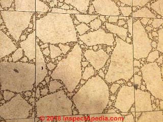 Do these floor tiles contain asbestos or not? (C) InspectApedia.com