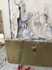 Cemetious metal door filler - does this contain asbestos? (C) InspectApedia.com Laura