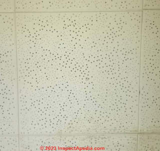 perforated acoustic ceiling tile (C) InspectApedia.com David