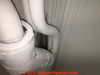 Felt type pipe insulation in a U.K. installation (C) InspectApedia.com D Friedman & JL