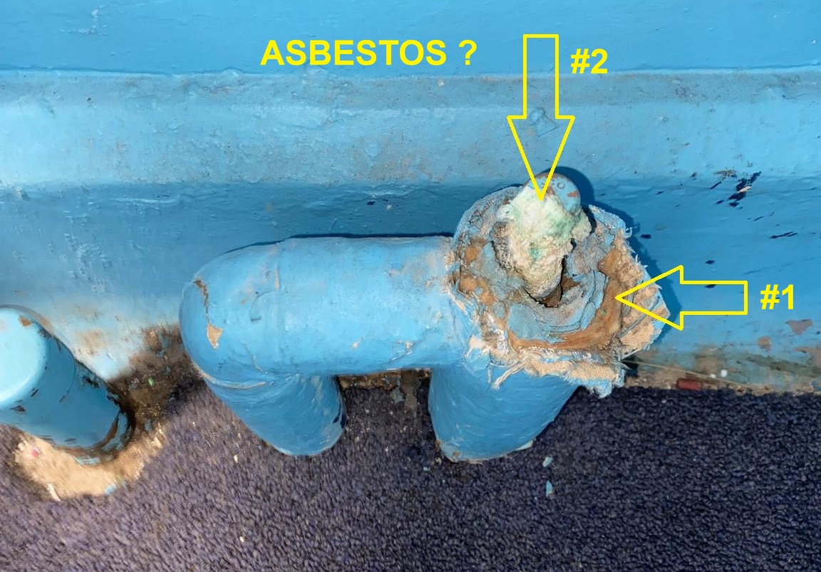 POssible asbestos pipe insulation (C) InspectApedia.com Mike