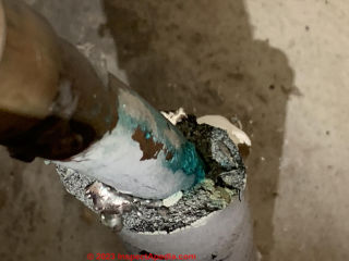 Black foam pipe insulation - not asbestos (C) Inspectapedia.com Morgan