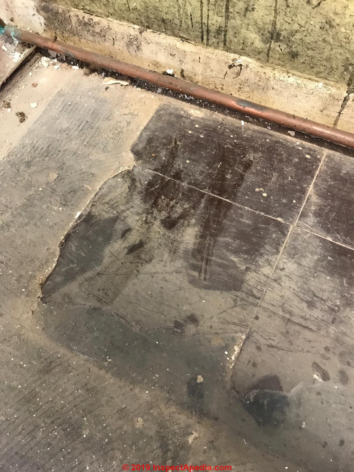 asbestos under tile