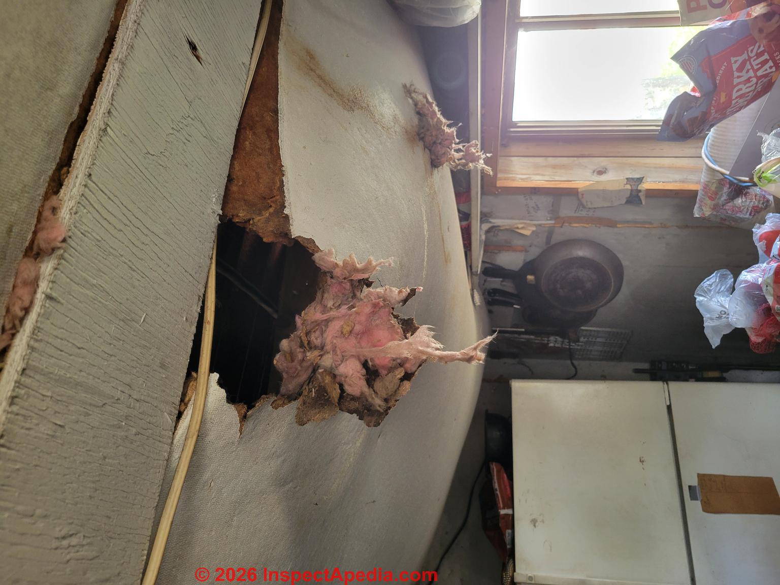 Walk in freezer ceiling insulating board (C) InspectApedia.com MikeA