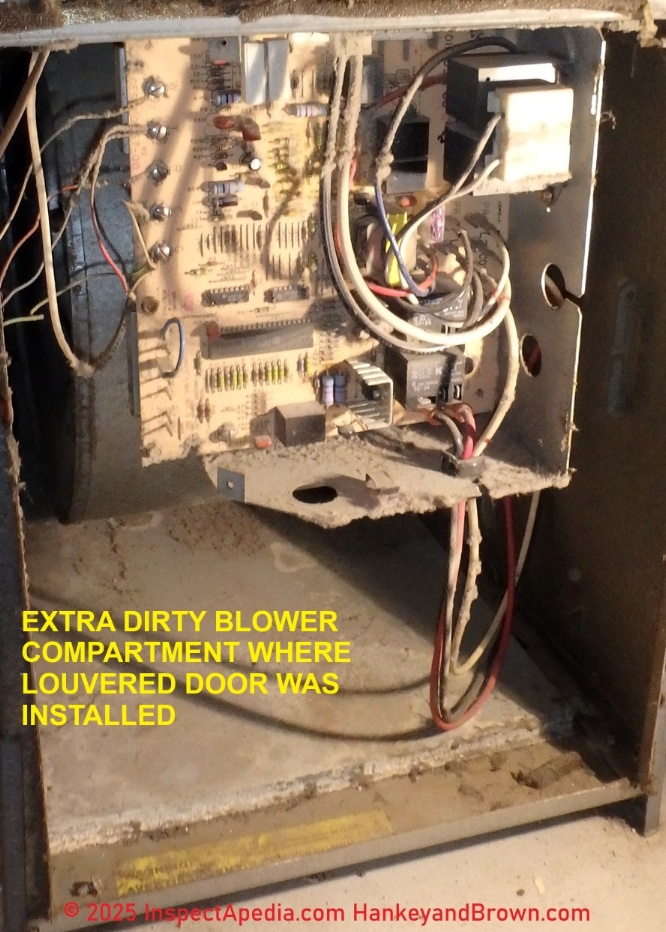 Carrier furnace with very dirty blower compartment where louvered rather than solid door was installed (C) Roger Hankey at InspectApedia.com and at HankeyandBrown.com