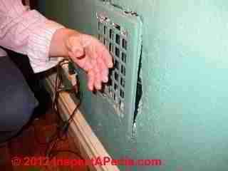 Wall warm air supply register in a NYC apartment © D Friedman at InspectApedia.com 