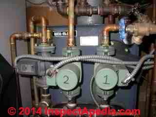 Heating circulator pumps mounted in varying positions (C) DanieL Friedman