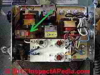 Reset switch on Energy Kinetics Oil Boiler © D Friedman at InspectApedia.com 