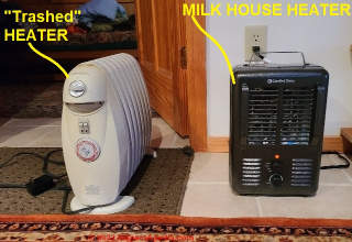 Photo of the discontinued-use electric heater next to a milkhouse heater fro Power Gear (C) Daniel Friedman at Inspectapedia.com