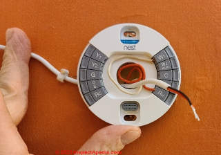 How to run wires from the C-wire adapter up to the thermostat (C) Daniel Friedman at InspectApedia.com