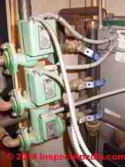 Heating zone circulators (Taco brand) with one valve partly close (C) Daniel Friedman