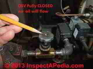 Oil tank drain valve leak (C) Daniel Friedman