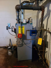 New Peerless PB Steam Boiler during installation (C) Daniel Friedman at InspectApedia.com
