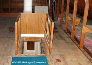 No cover to stop air leaks at attic pull-down stair (C) InspectApedia.com and hankeyandbrown.com images used with permission