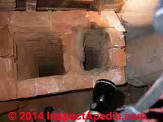 Unsafe unlined brick chimney & flues in an older home (C) Daniel Friedman