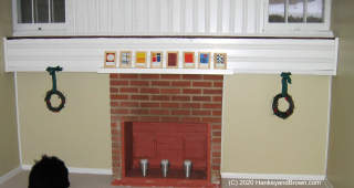 Faux fireplace hides unsafe gas appliance vent (C) InspectApedia.com and hankeyandbrown.com images used with permission