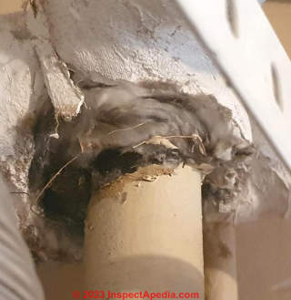 white fiberglass pipe insulation 1968 France (C) InspectApedia.com Christophe