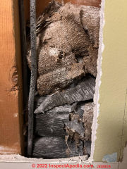 Kraft / Crepe wall insulation (C) InspectApedia.com Jessica