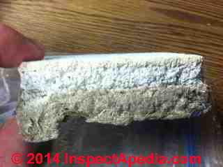 Fiberboard insulating wallboard from a 1944 Minnesota home (C) InspectApedia