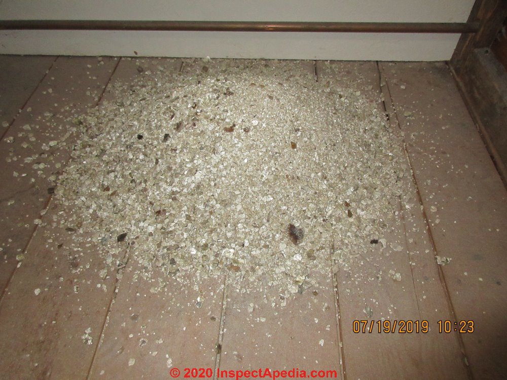 Hazards from falling loose-fill vermiculite insulation (C) InspectApedia.com David Grudzinski