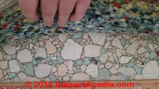Stone chip pattern flooring ID photo (C) Inspectapedia.com Michelle