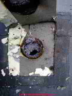 Lint blocked dryer vent at roof © D Friedman at InspectApedia.com 