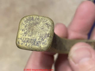 Bronze spike from the Pacific Ocean (C) InspectApedia.com Anon