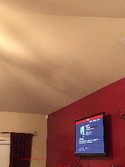 Thermal tracking on a ceiling near a TV (C) InspectApedia.com Jessica