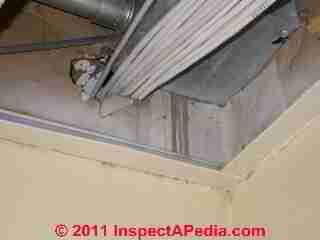 Hidden air paths above suspended ceiling © D Friedman at InspectApedia.com 