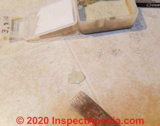Remove excess grout from the repair (C) Daniel Friedman InspectApedia.com